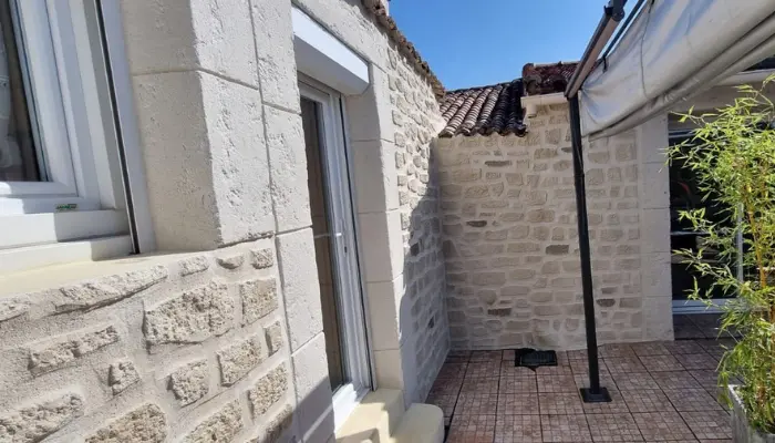 Enduit imitation pierre, toutes façades et jardinière - Boussay